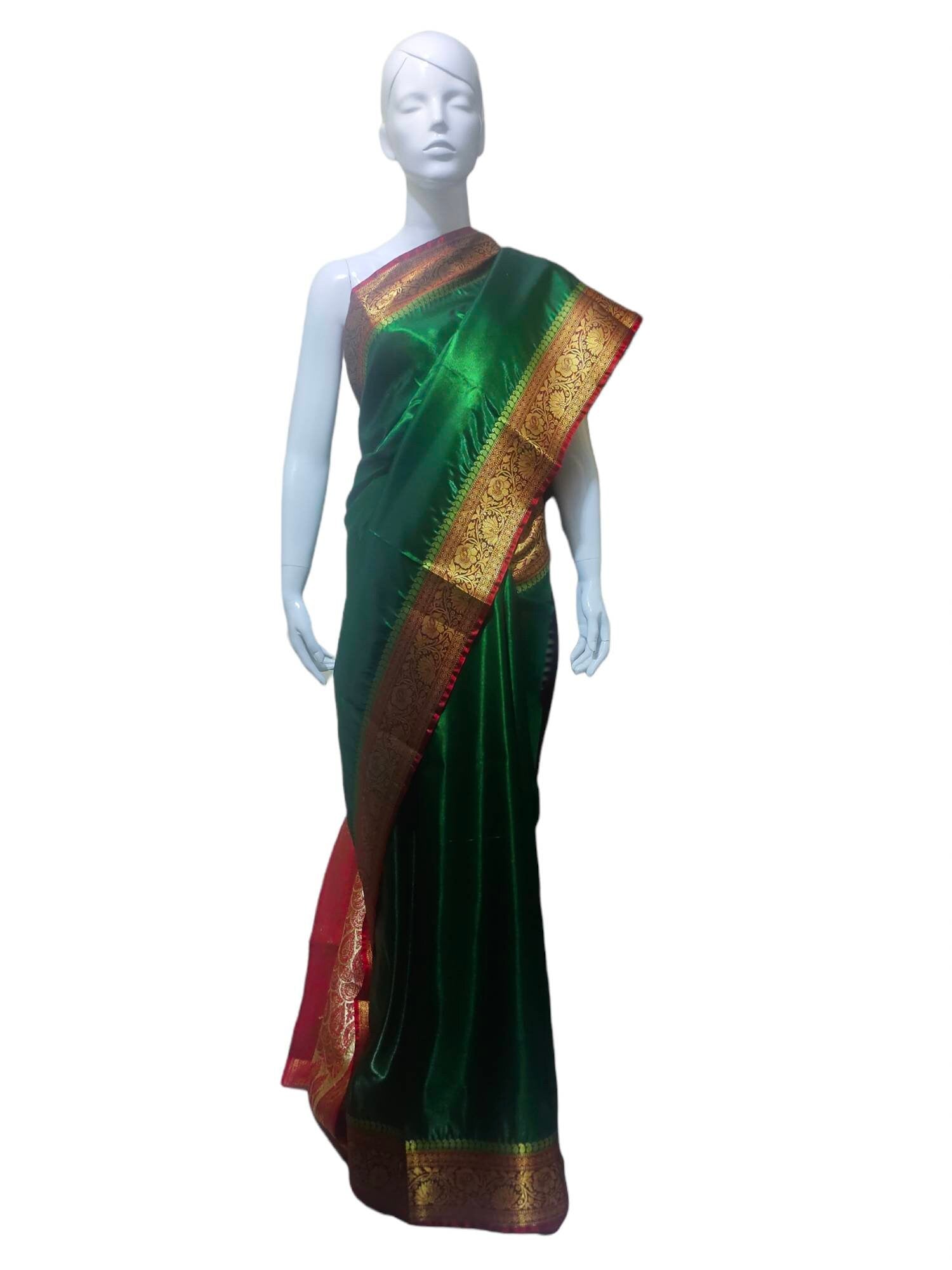 Dark green and Dark red satin silk saree with banarasi border and red unstiched blouse and green cotton peticoat Bollywood modern festivals