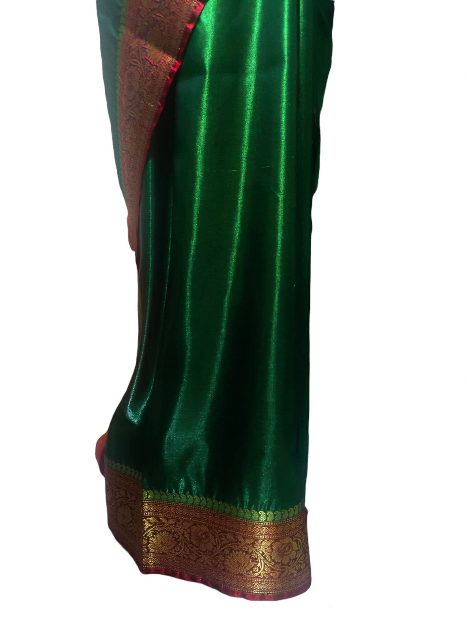 Dark green and Dark red satin silk saree with banarasi border and red unstiched blouse and green cotton peticoat Bollywood modern festivals