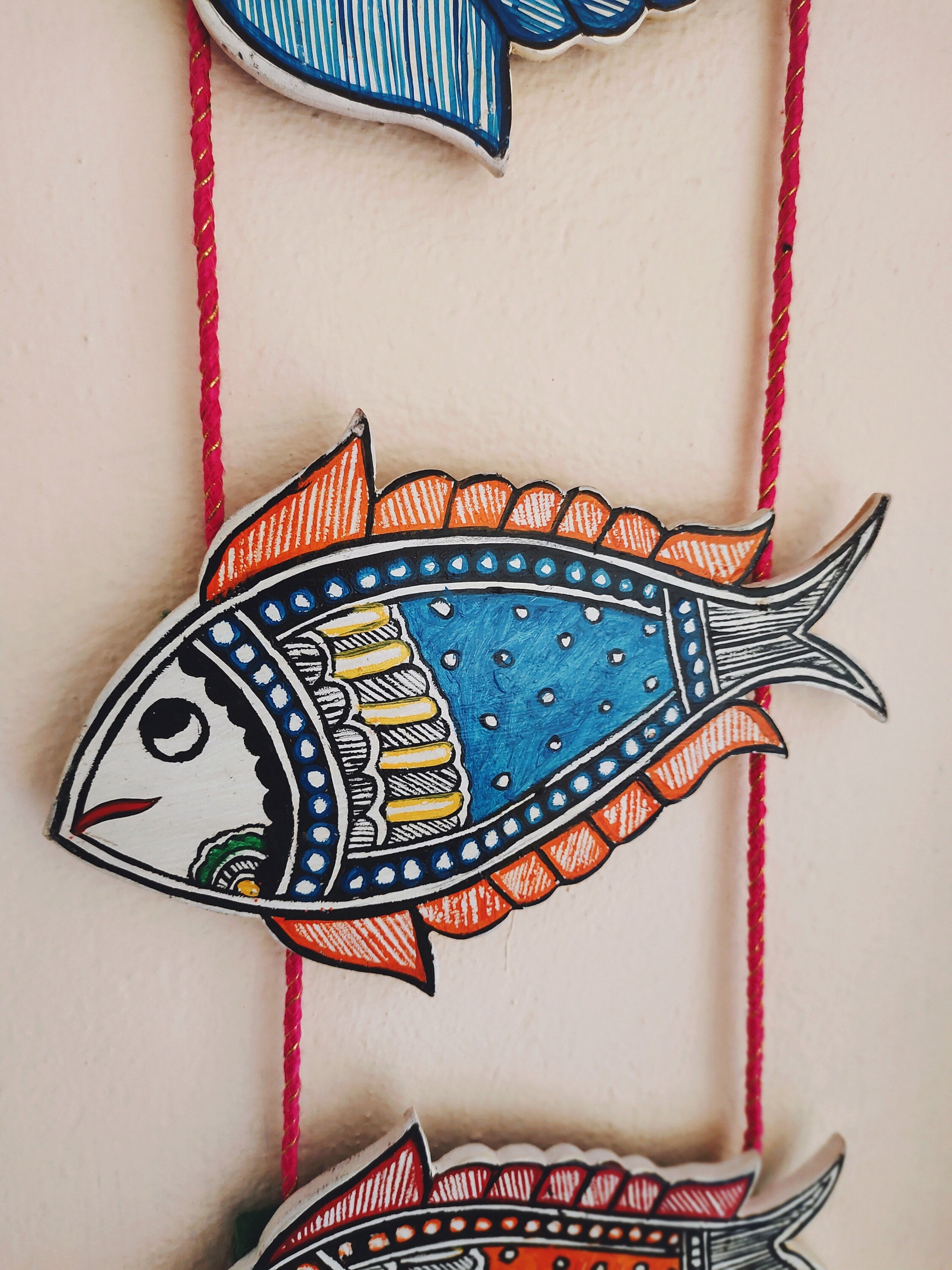 3 Fish Family Wooden Handmade Madhubani Painted Hand-painted Decorative Wall Hanging With Pink Silk Thread For Easy Attachable